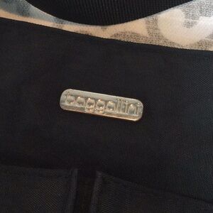 Baggallini purse with shoulder crossbody strap.